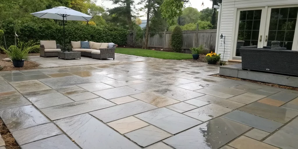 A wet-look sealed paver patio, a key point in the cons of sealing pavers.